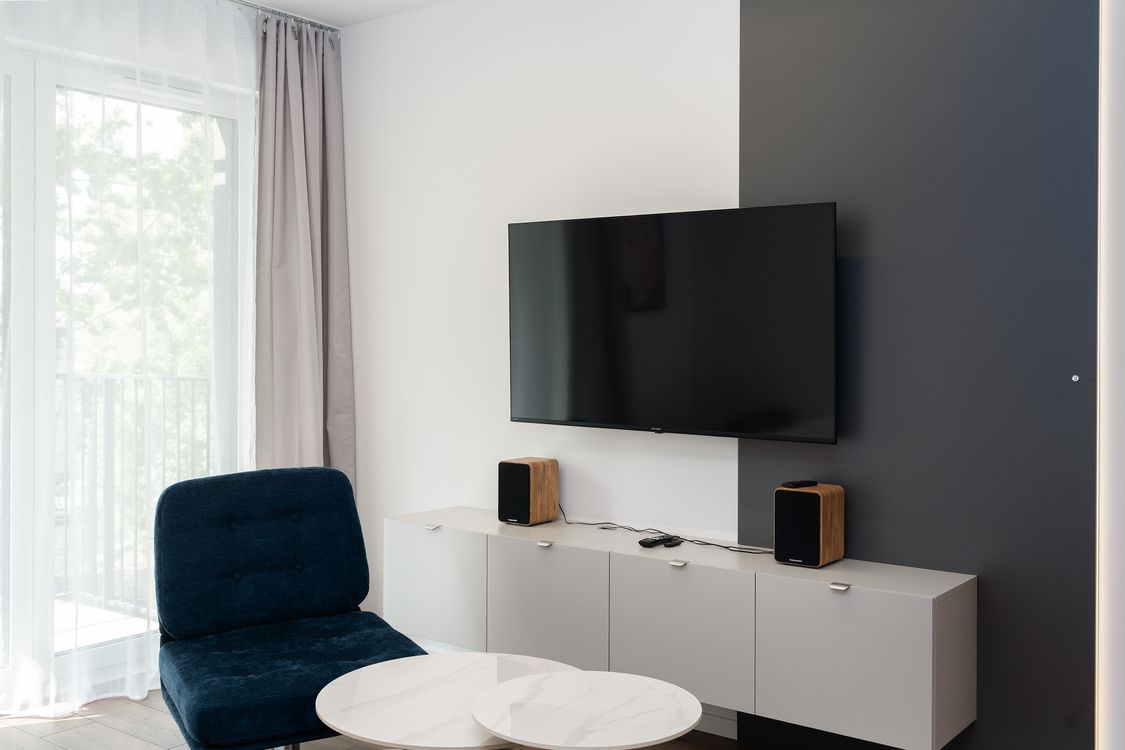 Wall-mounted TV in a modern living room